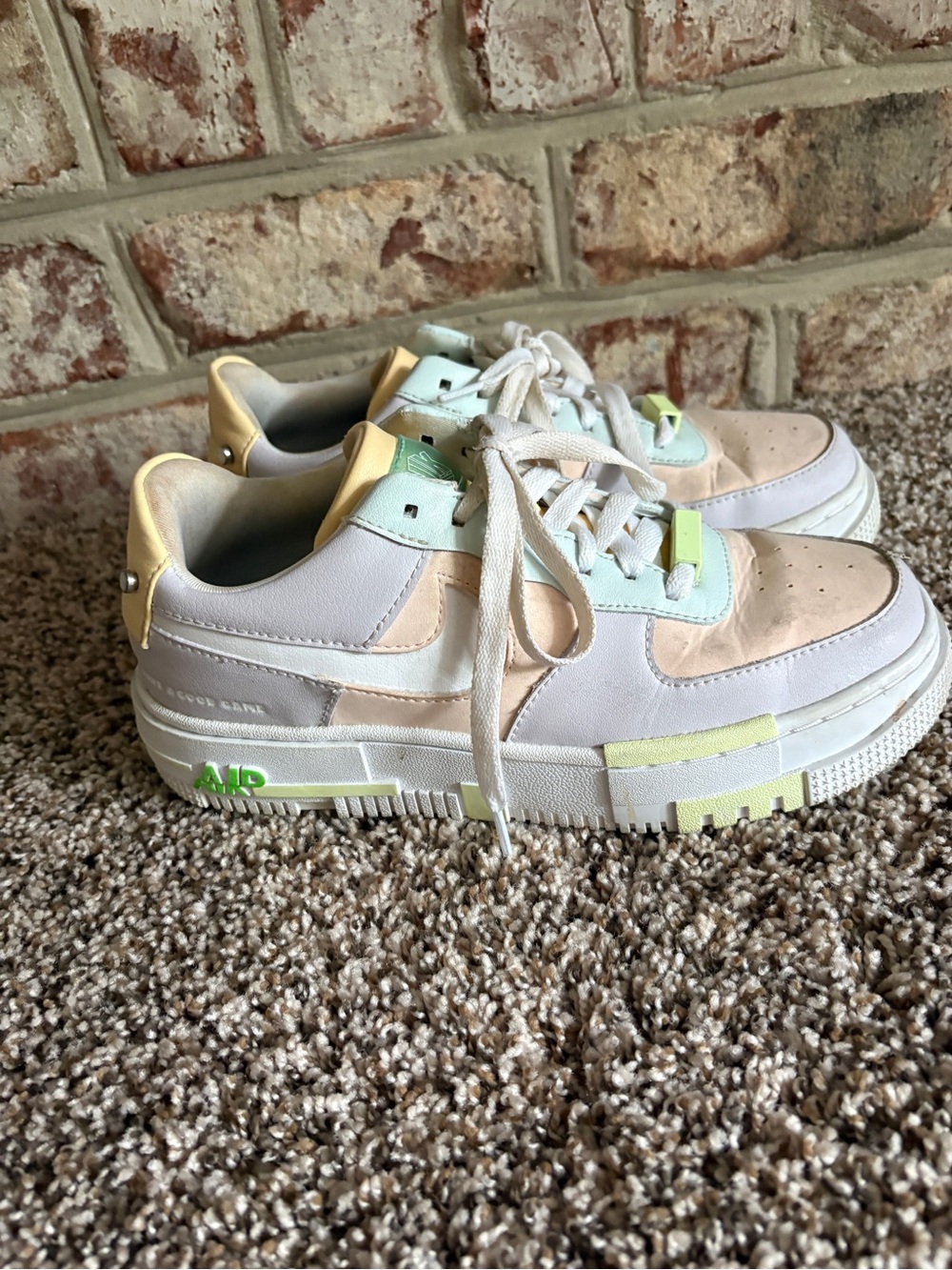 Nike White Sneakers with Pastel Accents